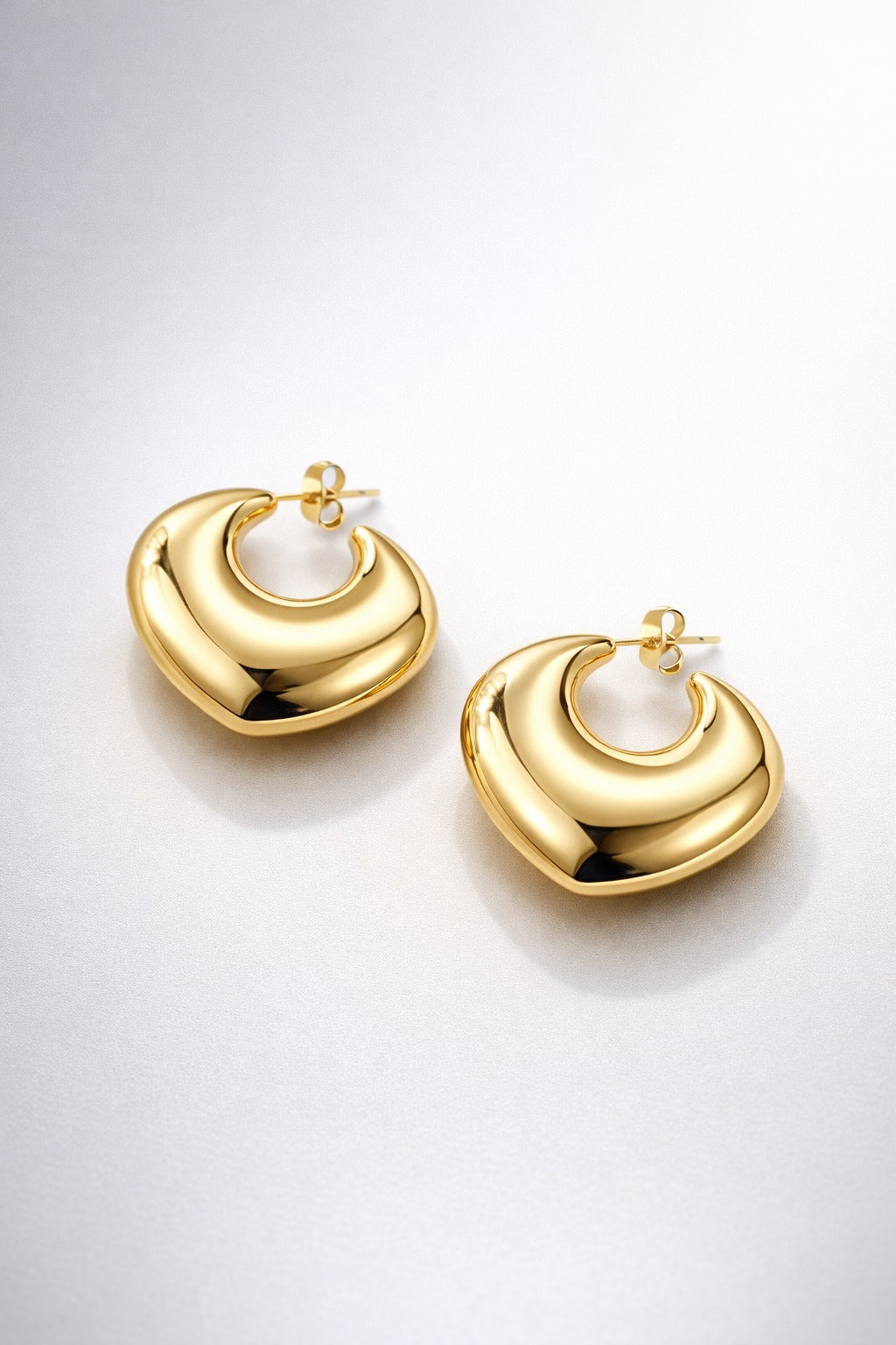 Molten Curve Gold Hoop Earrings